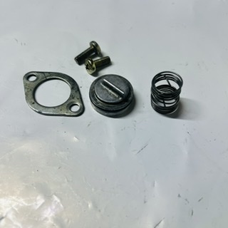 bouchon + ressort valve sur cylindre 125 rm 1993